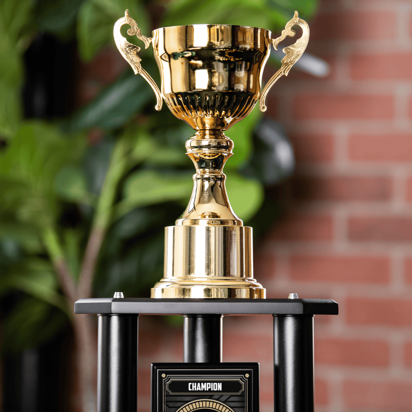 gold cup topper that can be used as a standalone trophy or on a base