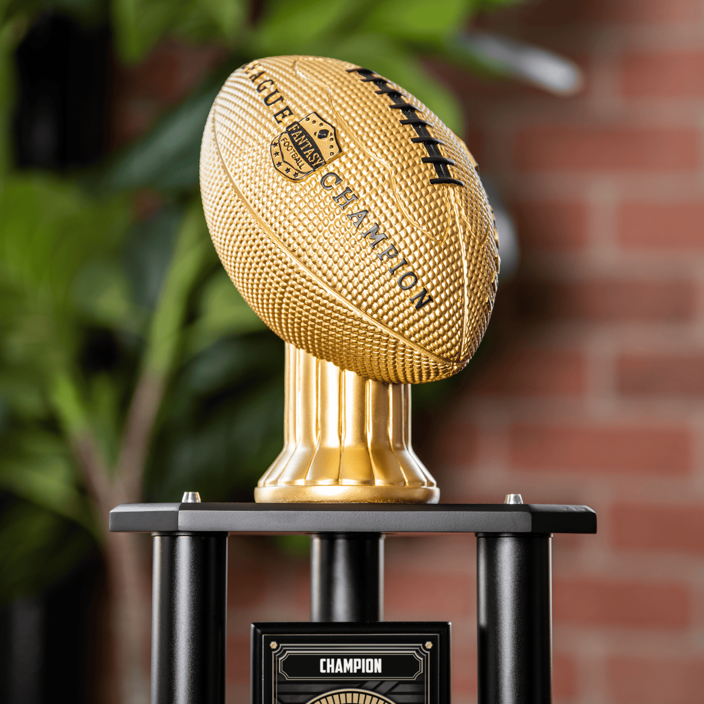 Gold vivid football trophy with a customizable topper and football design